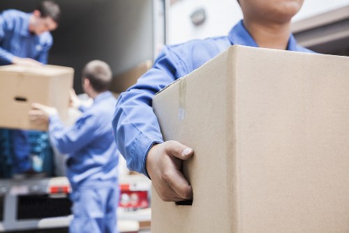 Same day removals team loading furniture for a Hackney move