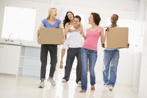 Packing boxes and household items in a Hackney home