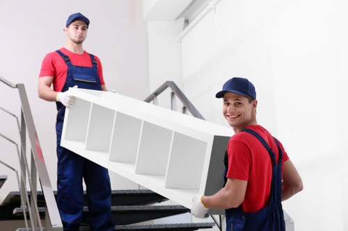 Professional movers planning access and parking for a Hackney home removal