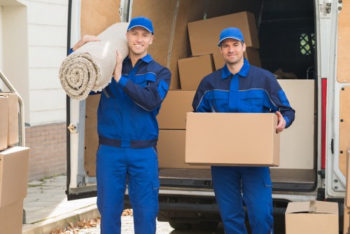 People preparing boxes and furniture for a Hackney move