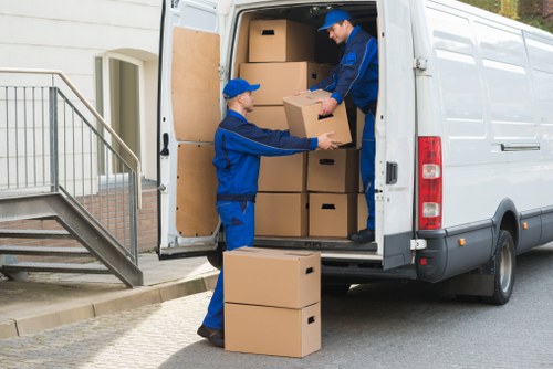 Packed boxes and furniture ready for a home move in Hackney
