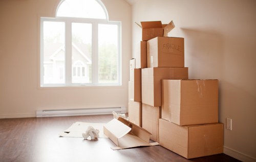 Professional movers loading furniture for a Hackney relocation