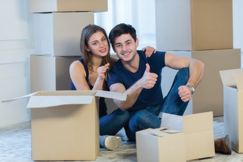 Packing boxes and furniture prepared for a home move in Hackney