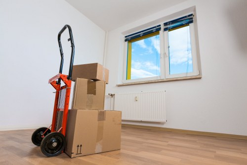 Team packing desks and equipment for an office move in Hackney