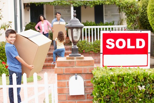 Professional movers in Hackney handling furniture and boxes with care